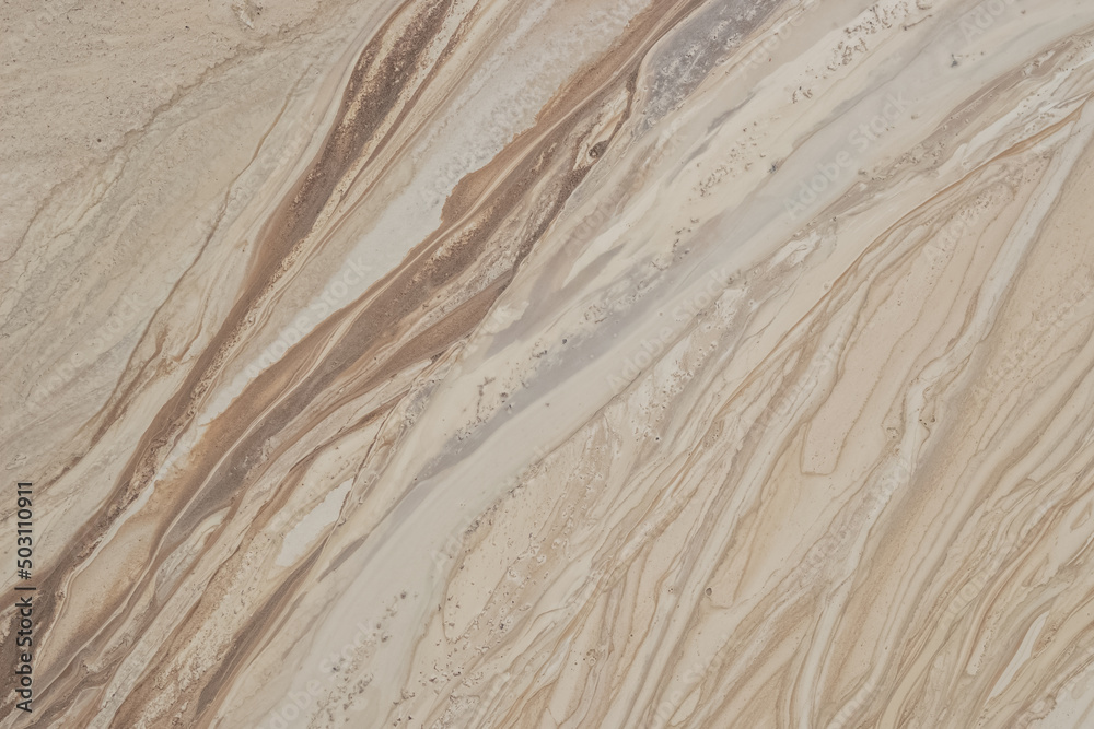 Water-eroded surface of limestone and sand. Water-eroded surface of limestone and sand.