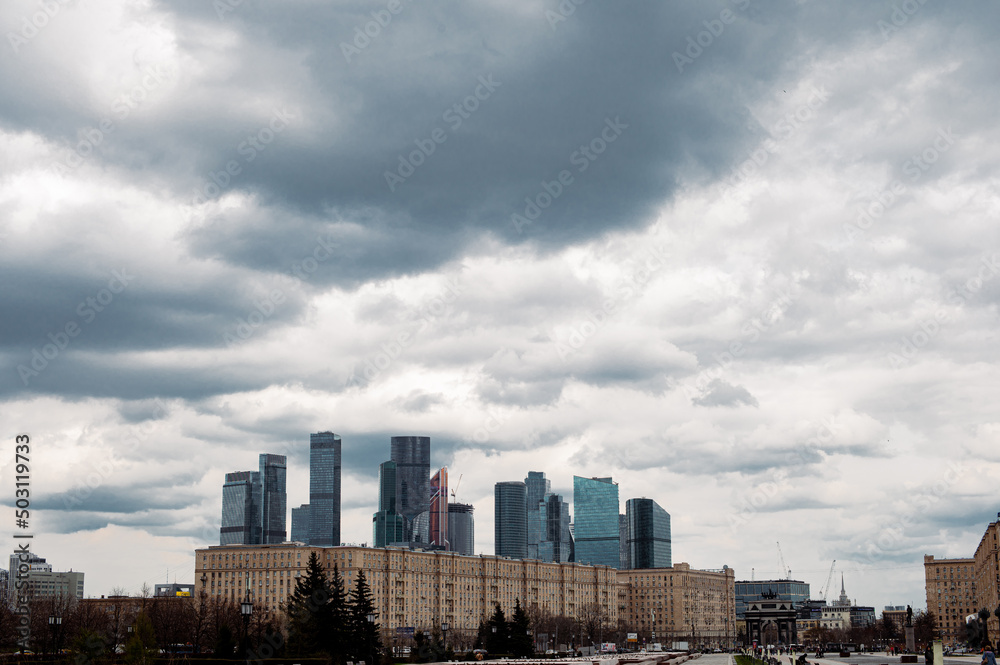big city, skyscrapers, skyline and blue clouds 