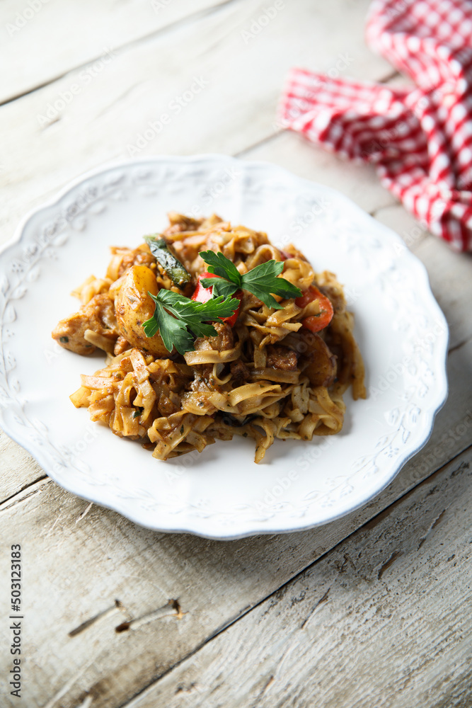 Wok noodles with chili and potato Wok noodles with chili and potato