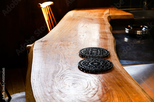 The sunlight strikes the long table