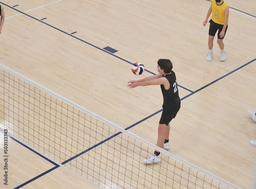 Volleyball player passes easy ball in a sixes game Volleyball player passes easy ball in a sixes game