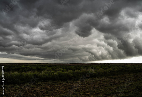 Canvas Print Cloudy stormy sky over the coastal plains