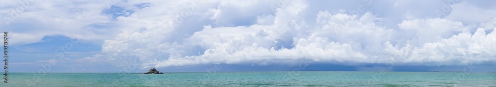 Panoramic Tropical sea in sunny day with small island Panoramic Tropical sea in sunny day with small island