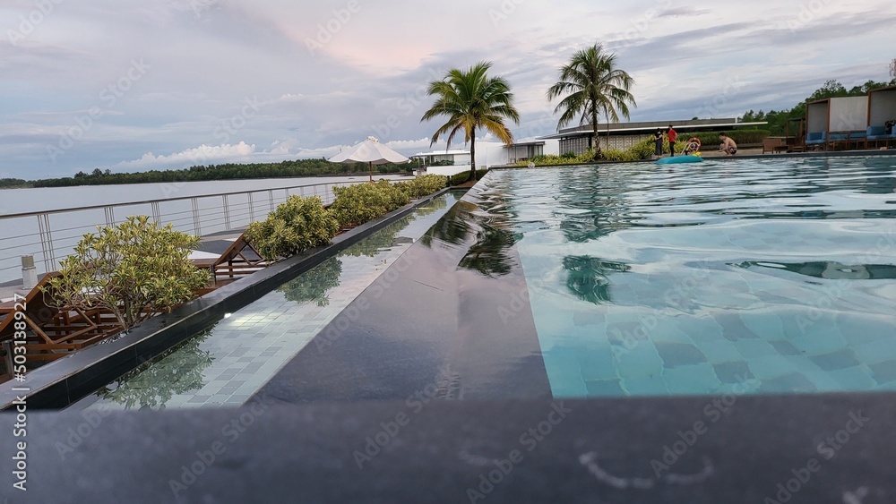 Kuching, Sarawak Malaysia - May 6 2022: The Amazing Surroundings of The Cove 55 Luxury Boutique Seaside Hotel with a Cool Infinity Pool