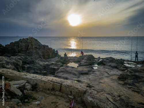 Rocky coast of Tangier at sunset