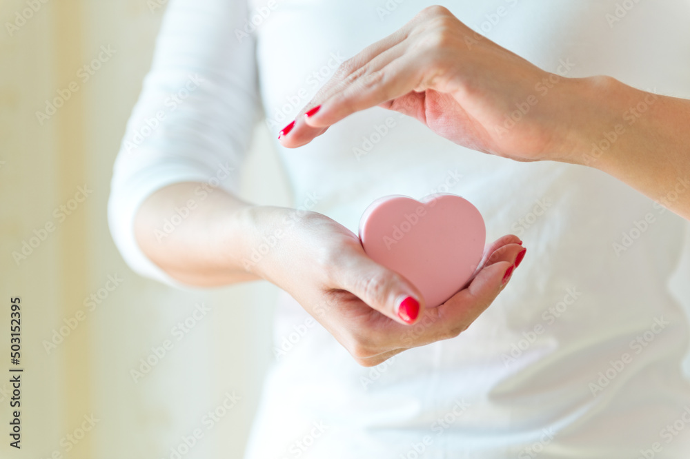 love concept. holding a red heart in hands. love concept. holding a red heart in hands.