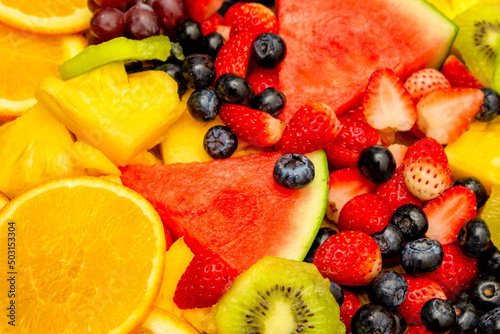 Fototapeta Naklejka Na Ścianę i Meble -  Fresh fruits background, Healthy mix fruits consist of tropical fruit and assorted berry