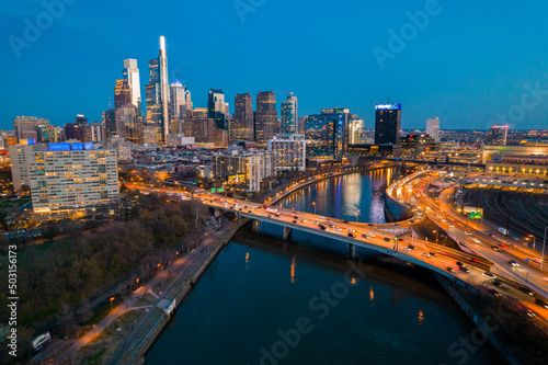 Aerial Drone View of Philadelphia Skyline with a Bridge Along a River