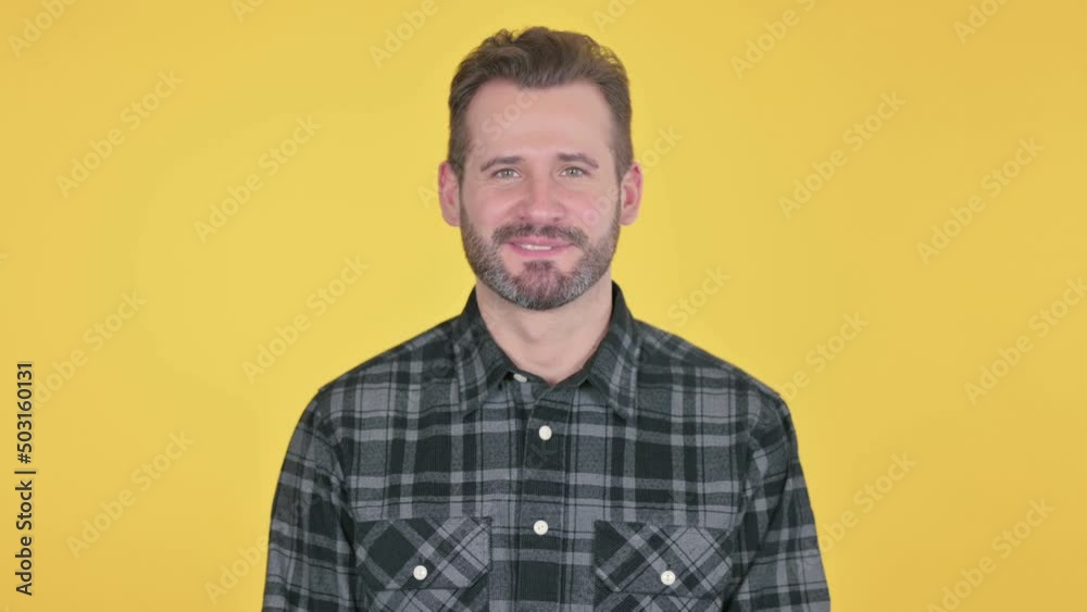 Portrait of Attractive Middle Aged Man Smiling at Camera Portrait of Attractive Middle Aged Man Smiling at Camera