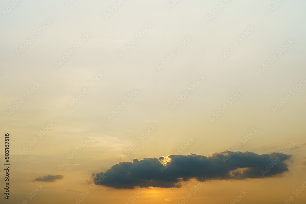 light yellow evening sky clouds background