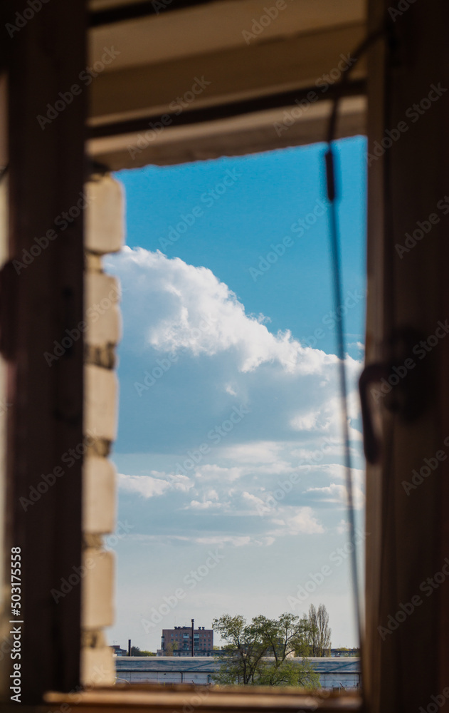 Clouds outside. Clouds through window. Fluffy clouds outside Clouds outside. Clouds through window. Fluffy clouds outside