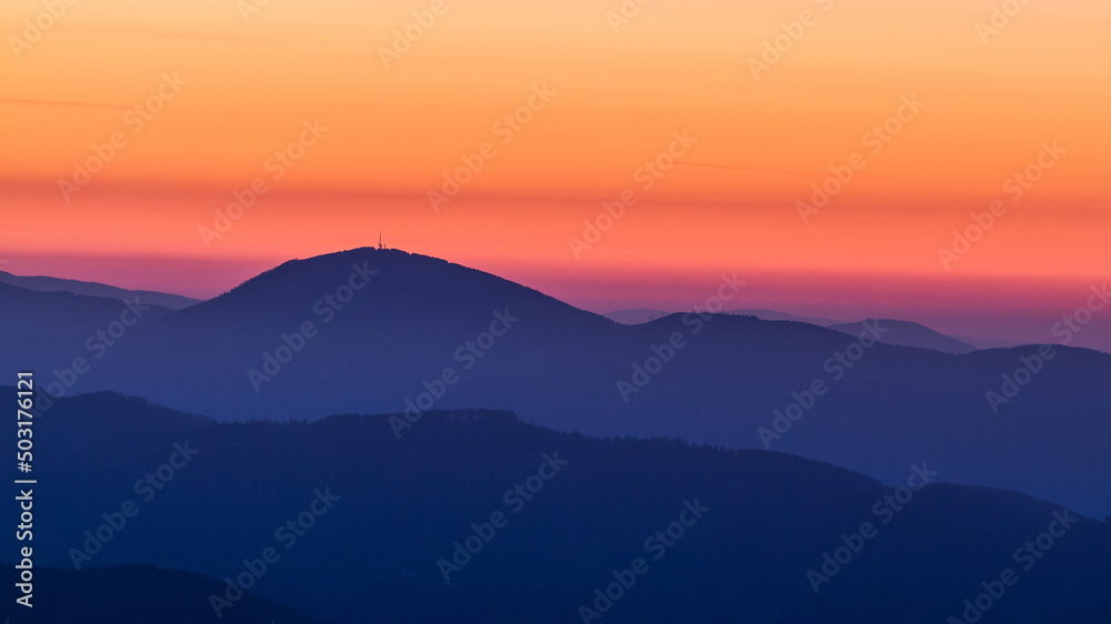 Colorful sunrise over the Schoeckl mountain near Graz in Austria