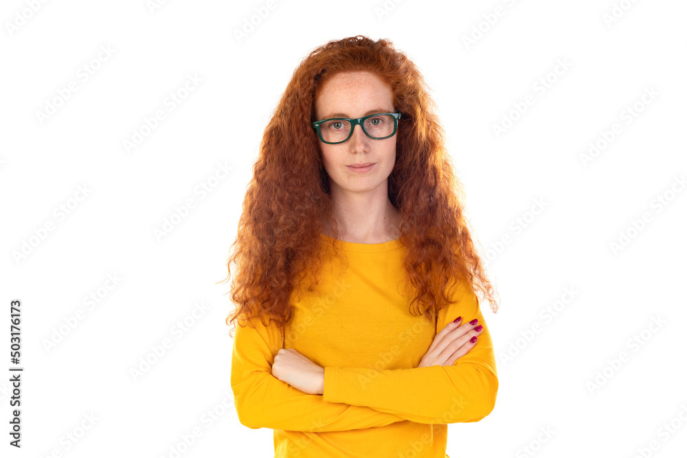 Head shot studio portrait young serious red-headed woman wearing blue t-shirt glasses looking at camera pose on grey white blank, spectacles eyewear offer Head shot studio portrait young serious red-headed woman wearing blue t-shirt glasses looking at camera pose on grey white blank, spectacles eyewear offer
