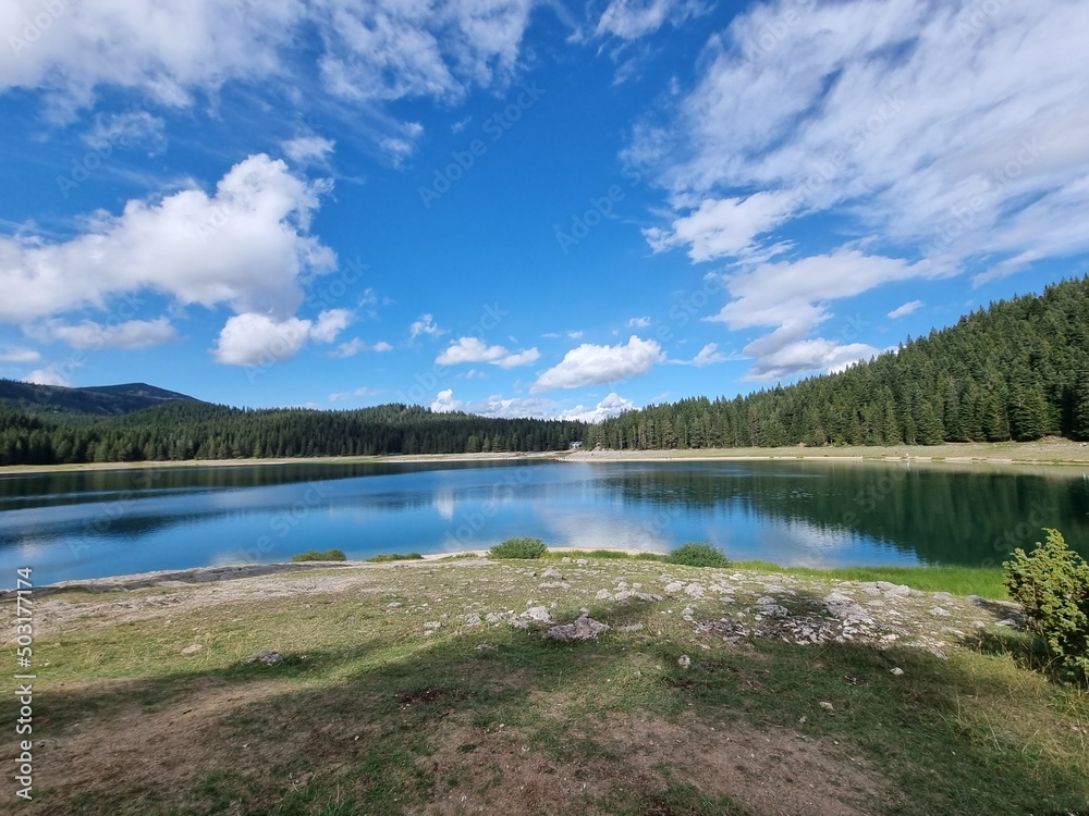 a beautiful landscape with a lake in the background in the mountains  near Blake lake in national park `durmitor` Montenegro. Unesco world heritage. Europe travel site. Vacation concept.  Tourism in a