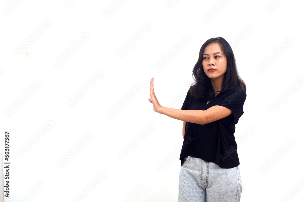 Asian girl with stop hand gesture. isolated over white background. copy space
