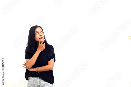 Thoughtful young woman standing isolated on white background © pakWw