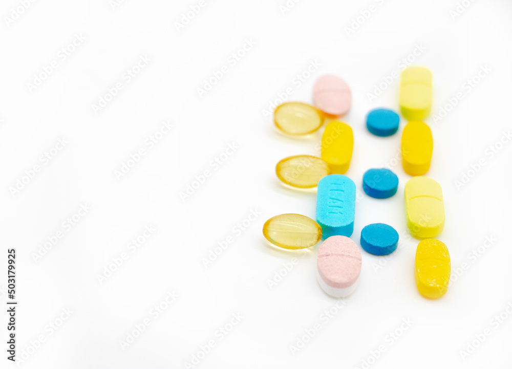 Different pills isolate on white background, side view Different pills isolate on white background, side view