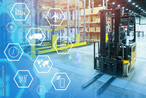 Technology fulfillment. Forklift in logistics warehouse. Fulfillment symbols next to forklift. Racks with boxes in warehouse. Goods fulfillment services. Storage and transportation of orders photo