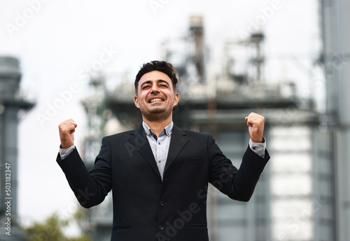 Portrait Cheerful business man with successful action, showing yes gesture and laughing. winner gesture expression 
