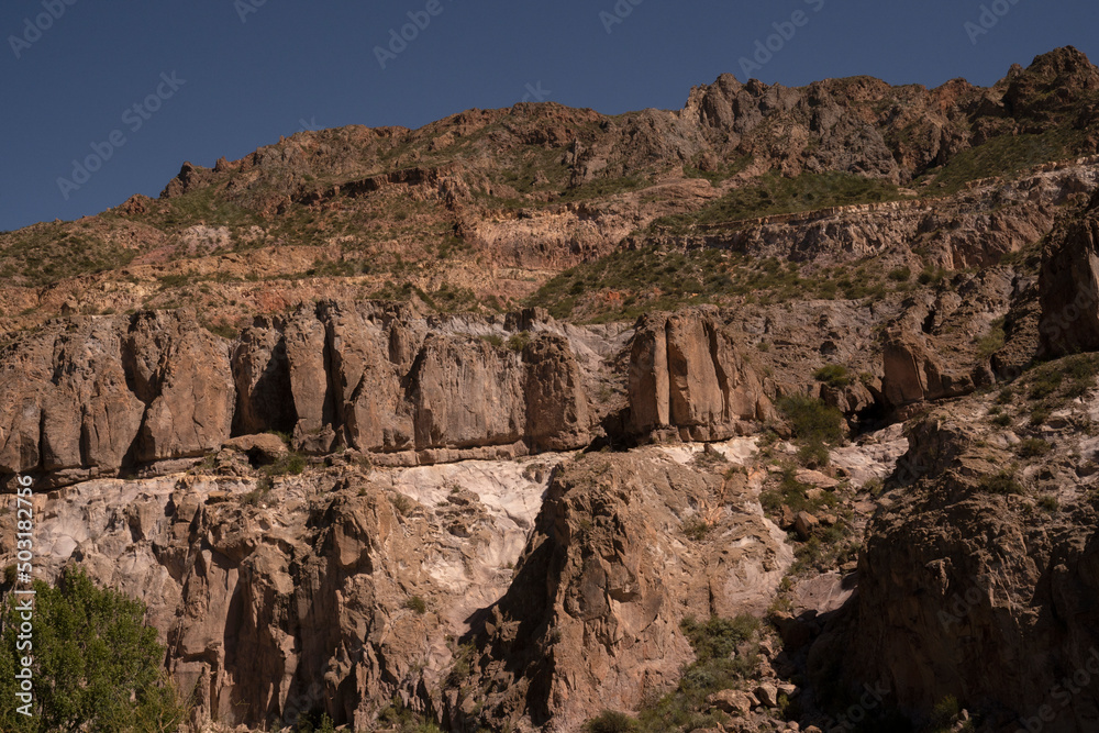 Desert landscape. View of the rock and sandstone cliffs in the arid mountains. Desert landscape. View of the rock and sandstone cliffs in the arid mountains.