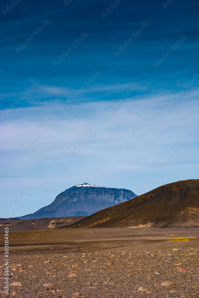 Cover page with Icelandic landscape of colorful volcanic caldera Askja, in the middle of volcanic desert in Highlands, with red, turquoise volcano soil and blue sky, Dreki trail, Iceland.