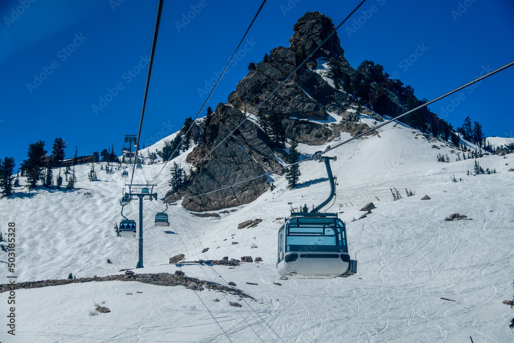 Gondola lift going up at the Snowbasin Ski Resort in Utah.