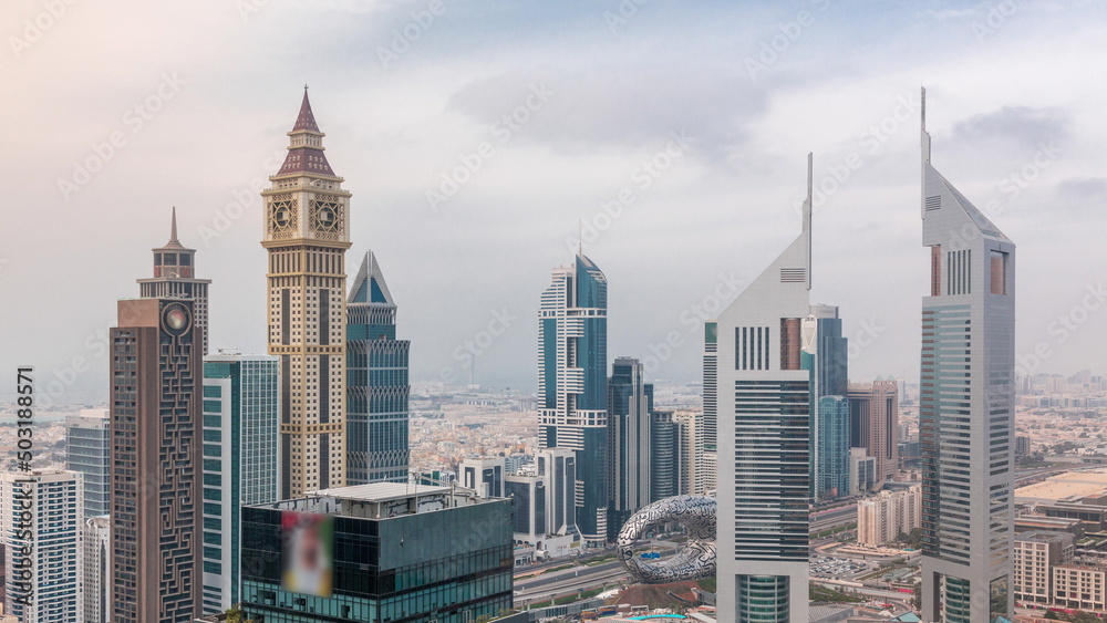 Obraz premium Skyscrapers on Sheikh Zayed Road and DIFC timelapse in Dubai, UAE.