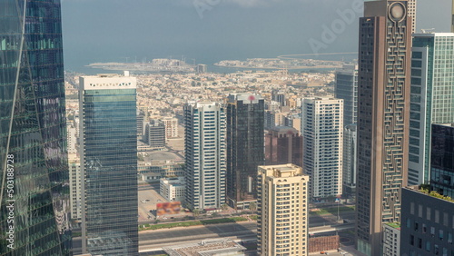 Skyscrapers on Sheikh Zayed Road and DIFC timelapse in Dubai, UAE.