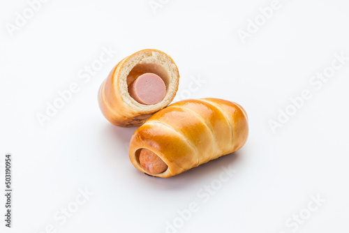 Sausage in the dough and half of the sausage in the dough