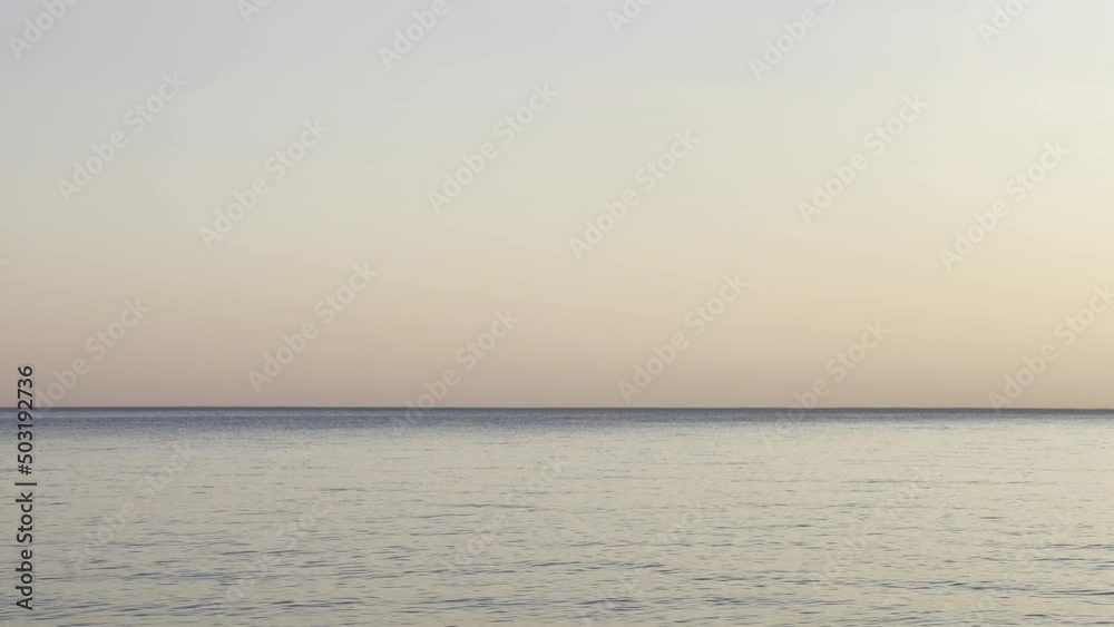 Wide shot of the sea horizon at dusk Wide shot of the sea horizon at dusk