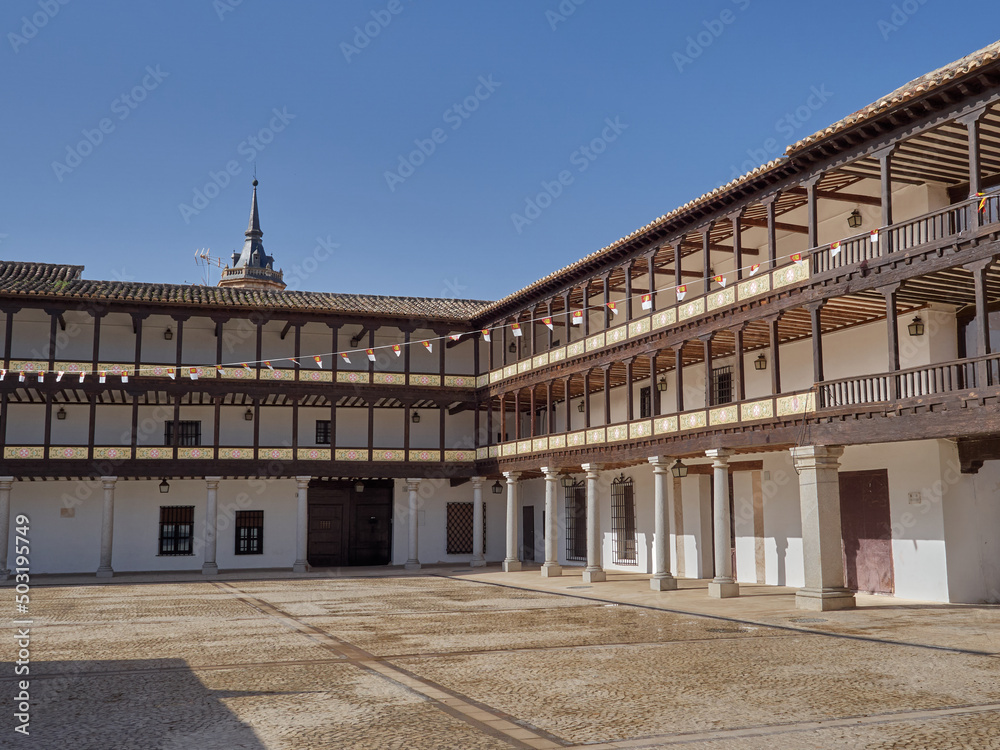 Main Square of Tembleque, Province of Toledo, Castilla La Mancha, Spain, Europe. It is a picturesque square with granite columns and two floors of corridors with wooden pillars. 