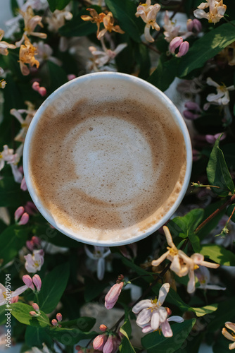 cup of coffee with flowers