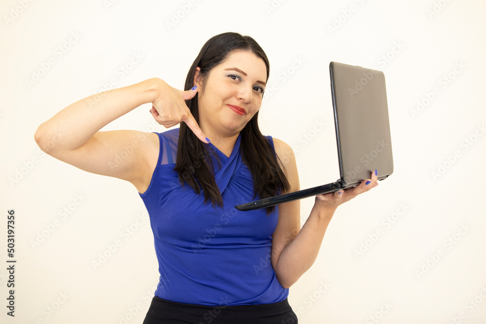 Cute asian and successful CEO, wearing blue blouse pleased demonstrating her work, holding laptop with her hand, on white background Cute asian and successful CEO, wearing blue blouse pleased demonstrating her work, holding laptop with her hand, on white background