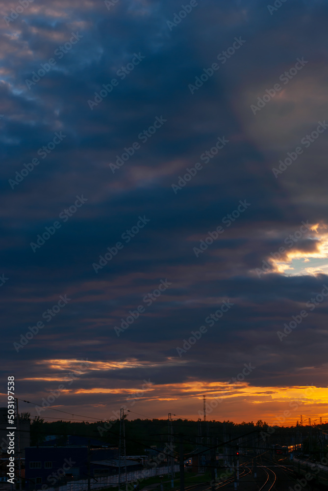 Dark skies at sunset in summer