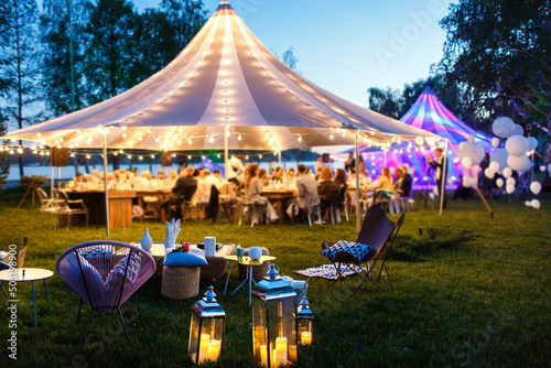 Colorful wedding tents at night photo