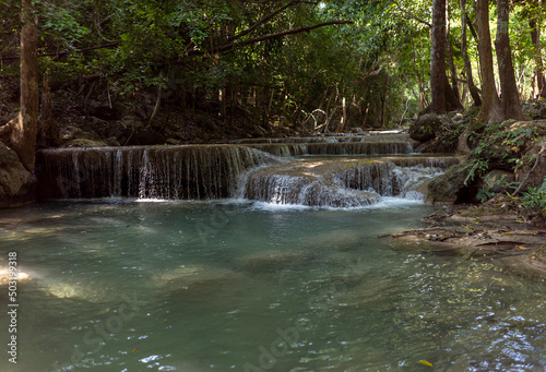 a waterfall that flows down to a level