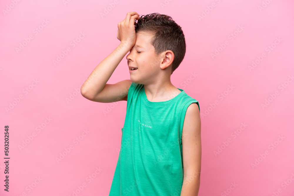 Little caucasian boy isolated on pink background has realized something and intending the solution Little caucasian boy isolated on pink background has realized something and intending the solution