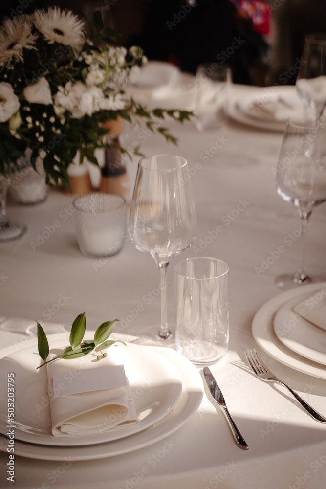banquet table in restaurant with flowers decoration