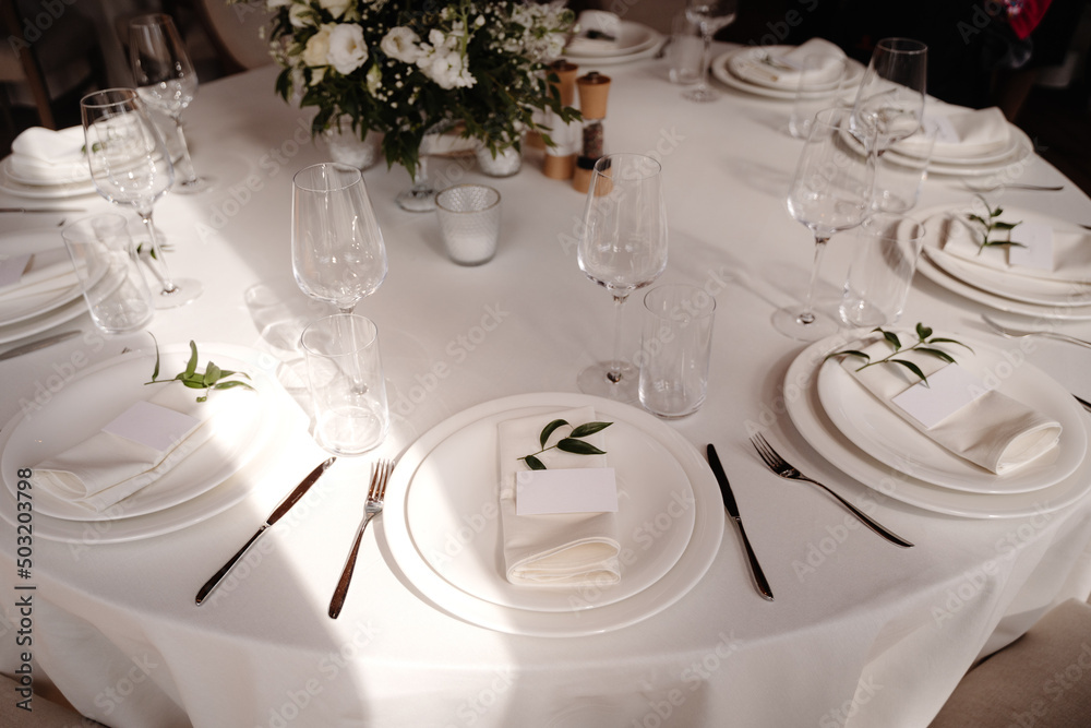 banquet table in restaurant with flowers decoration banquet table in restaurant with flowers decoration