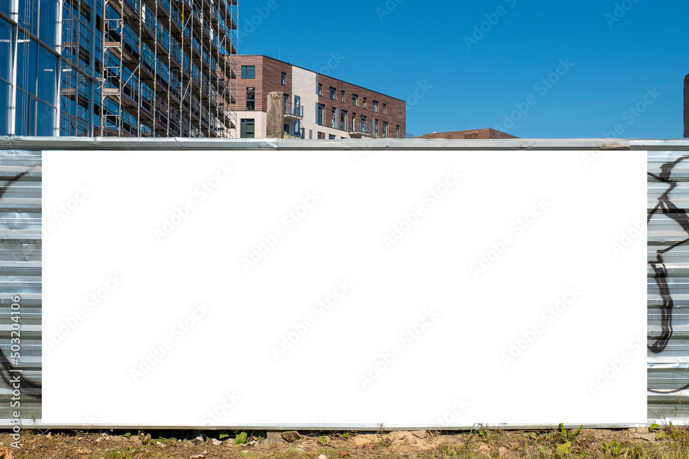 Blank white banner for advertisement on the fence of construction site Blank white banner for advertisement on the fence of construction site