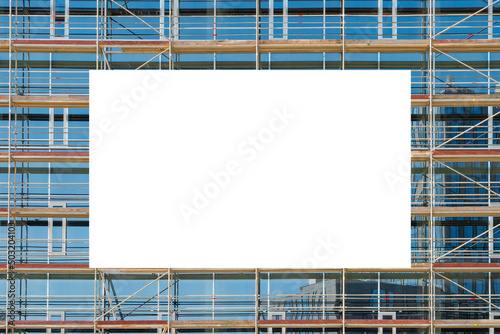 Advertising billboard mock-up mounted on the scaffolding photo