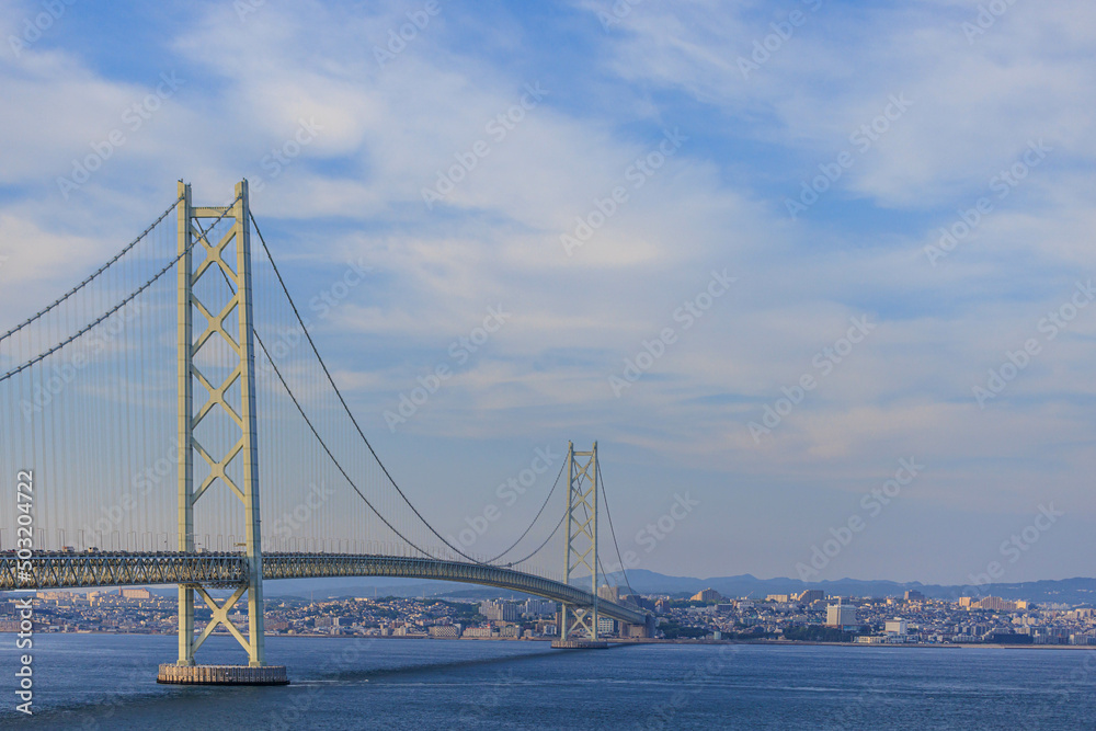 Light clouds over Akashi Kaikyo, the longest suspension bridge in the world Light clouds over Akashi Kaikyo, the longest suspension bridge in the world