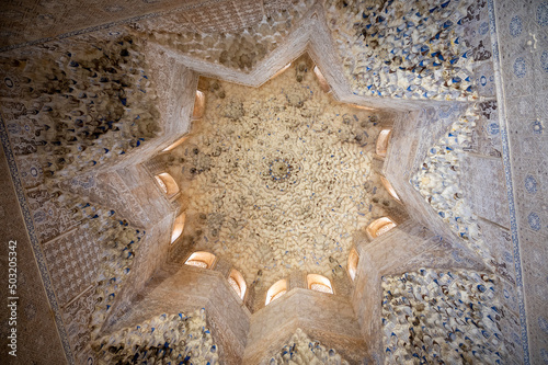 Ornamental ceiling and walls in Nasrid Palaces in the Alhambra palace Granada, Andalusia, Spain