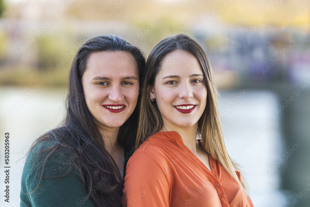 Obraz premium portrait of 2 lesbians embracing with great bokeh