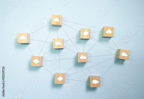 Top view wooden blocks with cloud icon set  to circle. Concept for cloud computing technology.