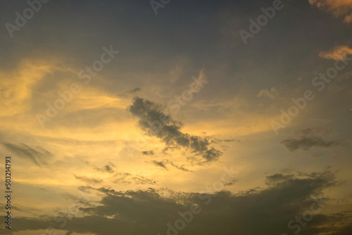 Fluffy clouds at sunset