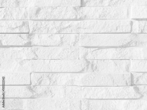 Seamless texture of white grey brick stone wall a rough surface, with space for text, for a background....