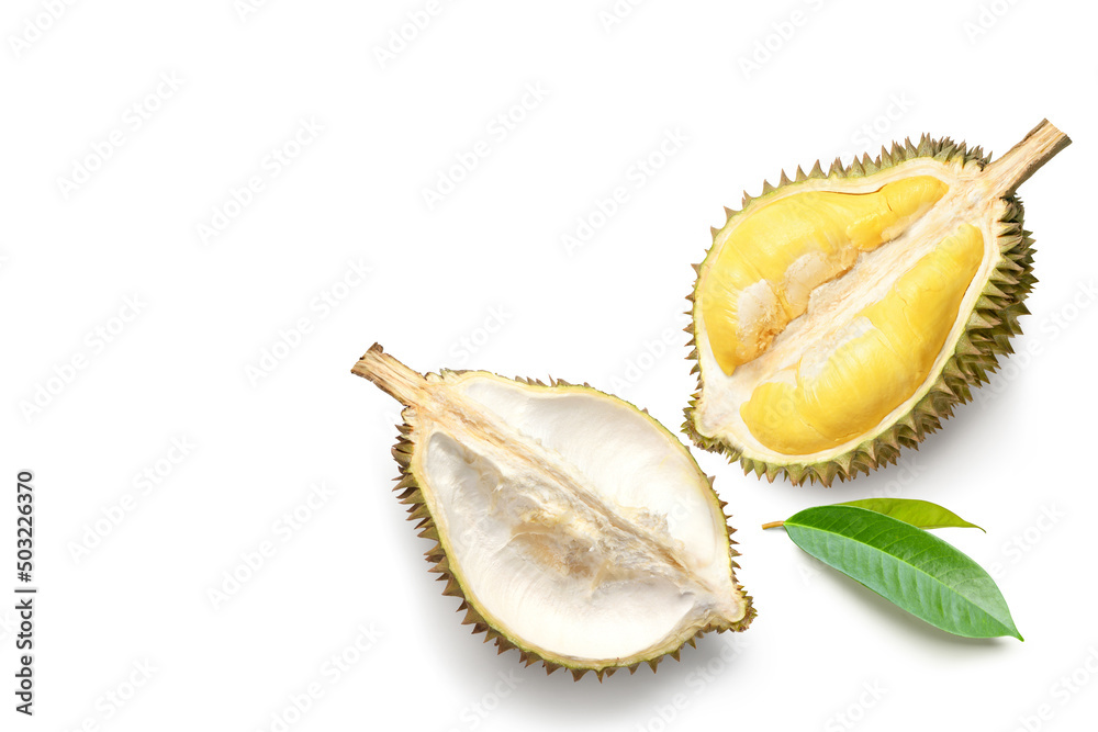 Flat lay of Durian fruit cut in half with leaves isolated on white background. Flat lay of Durian fruit cut in half with leaves isolated on white background.
