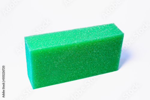 Washing sponge on a white background.
