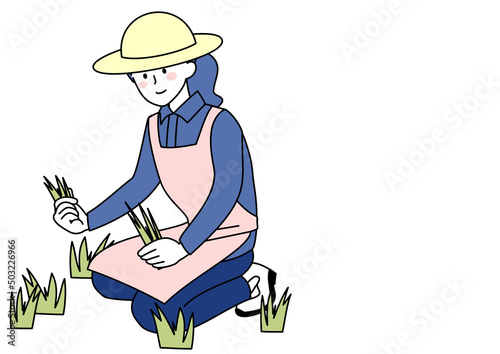 草むしりをする女性